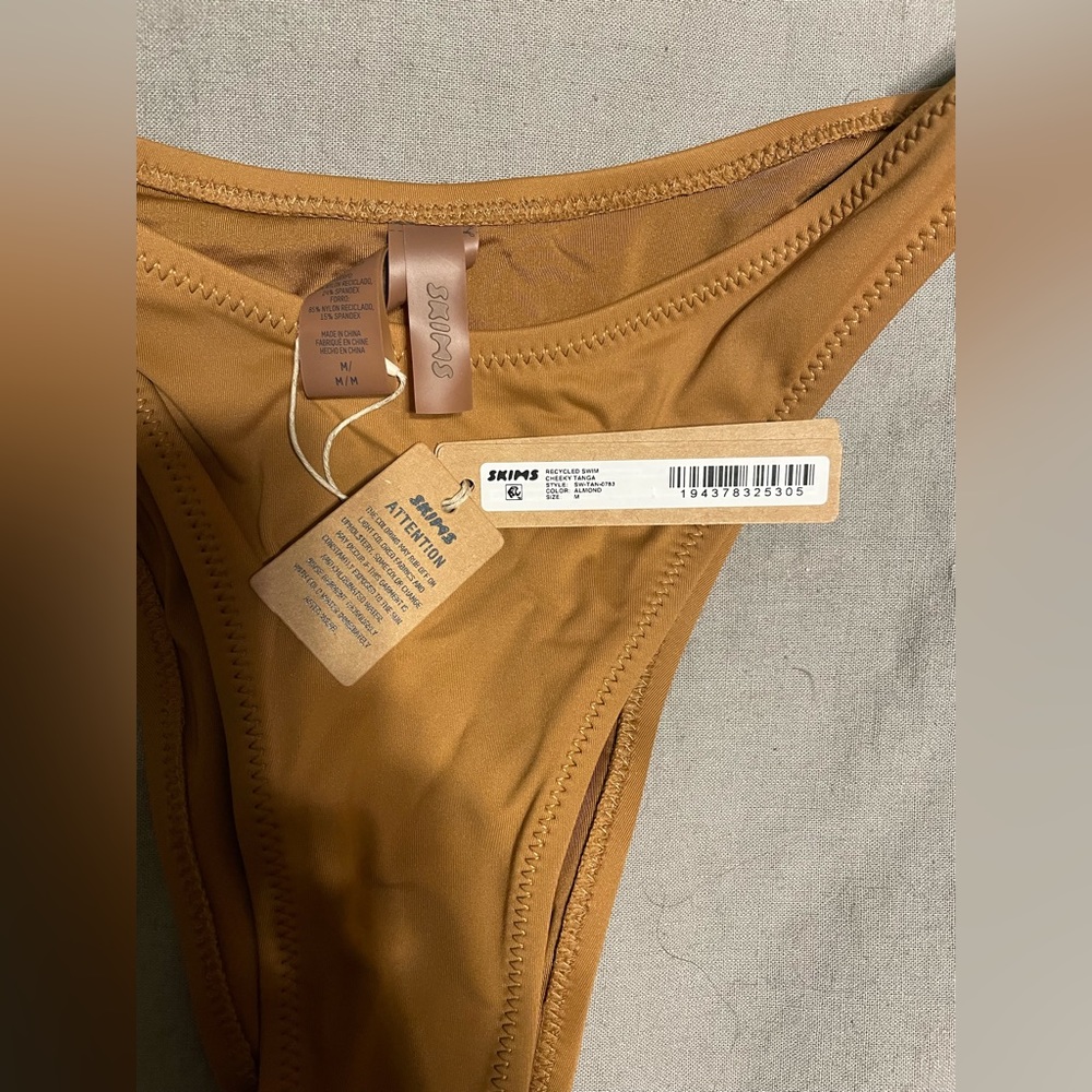 Skims cheeky Tinga bottoms in almond color